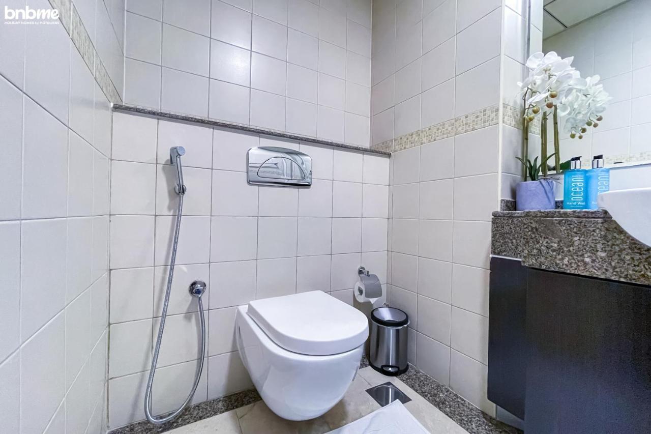 Bnbme - Bay Central Apartment Dubai Bagian luar foto